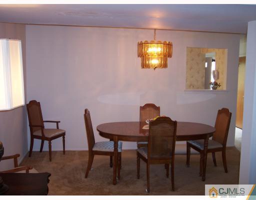 8006 Hana Road Edison, NJ 08817 - Photo 9 of 9 a view of a dining room with furniture and window