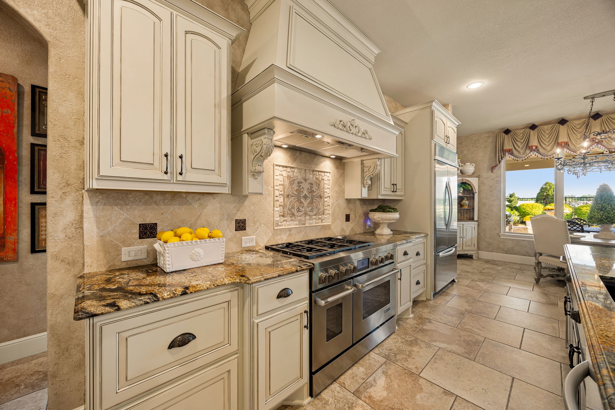 26515 Ashley Ridge Lane Katy, TX 77494 - Photo 15 of 50 a kitchen with stainless steel appliances granite countertop a stove and a white cabinets