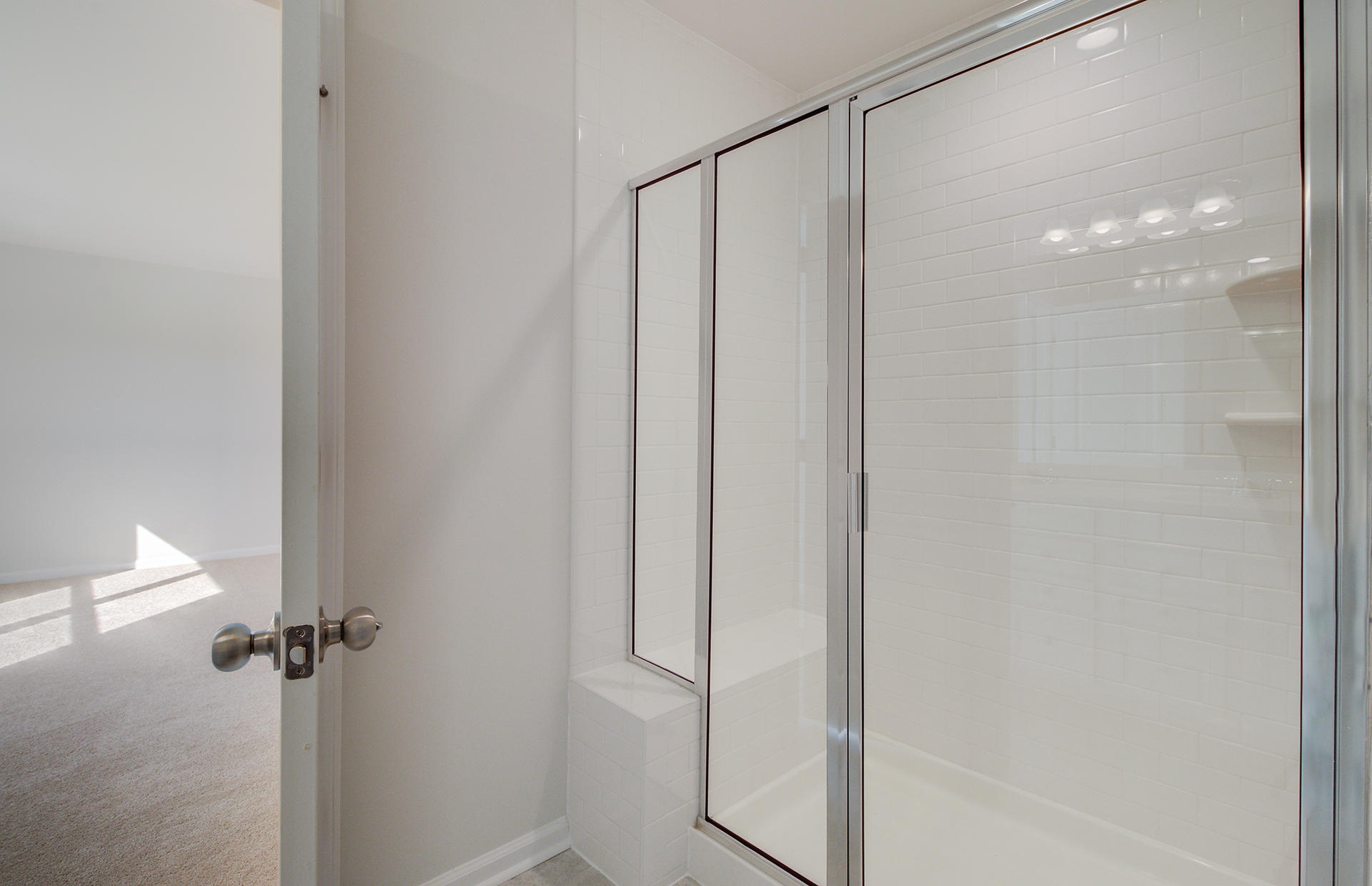163 Hayworth Road Summerville, SC 29486 - Photo 30 of 39 Mster shower with tile and bench seat
