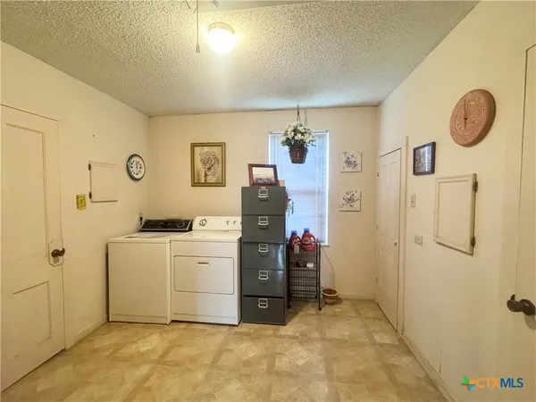 a view of a hallway with elevator