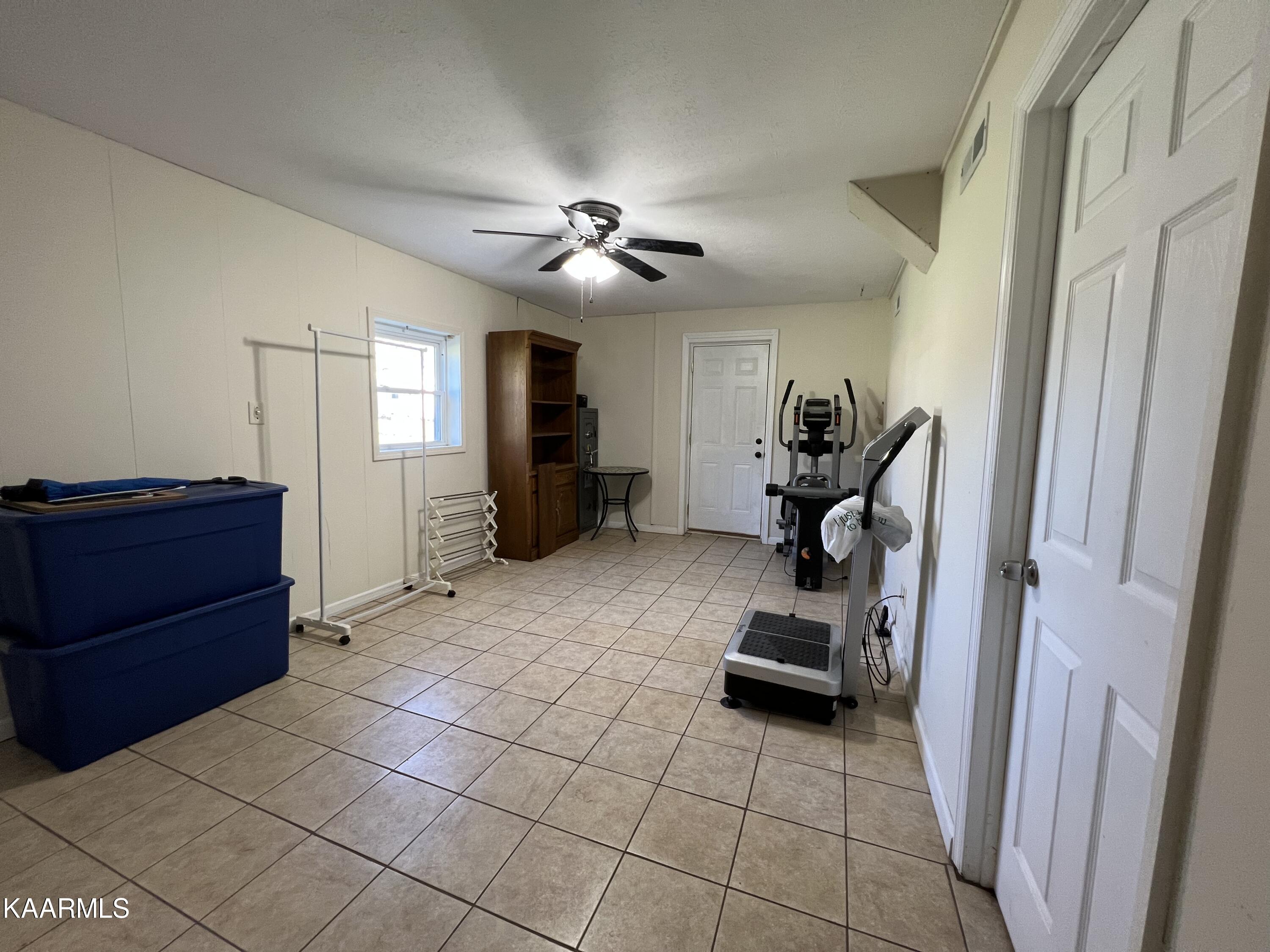 8000 Ewing Road Powell, TN 37849 - Photo 16 of 19 Basement rec room 2