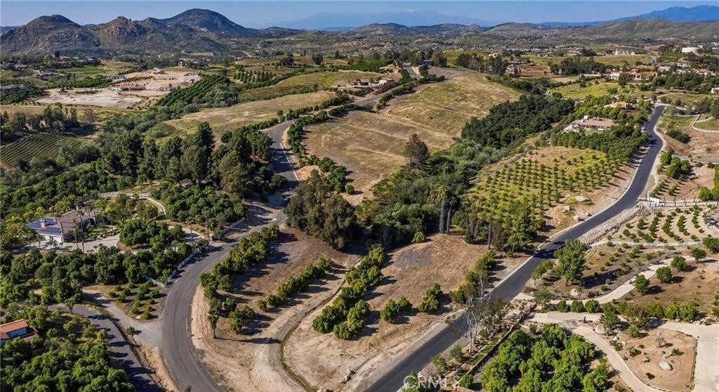 38538 Martin Ranch Road Temecula, CA 92592 - Photo 7 of 8 an aerial view of residential houses with outdoor space