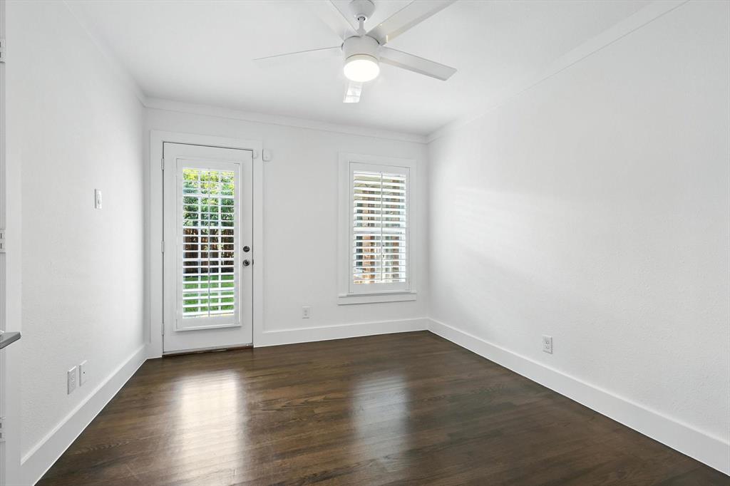 6116 St Moritz Avenue Dallas, TX 75214 - Photo 28 of 40 an empty room with wooden floor and windows