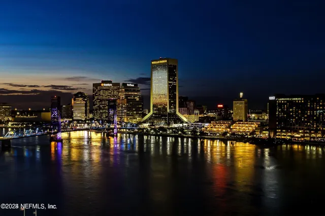 a view of a swimming pool with seating area