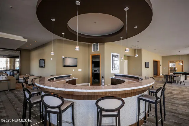 a room with gym equipment and a window