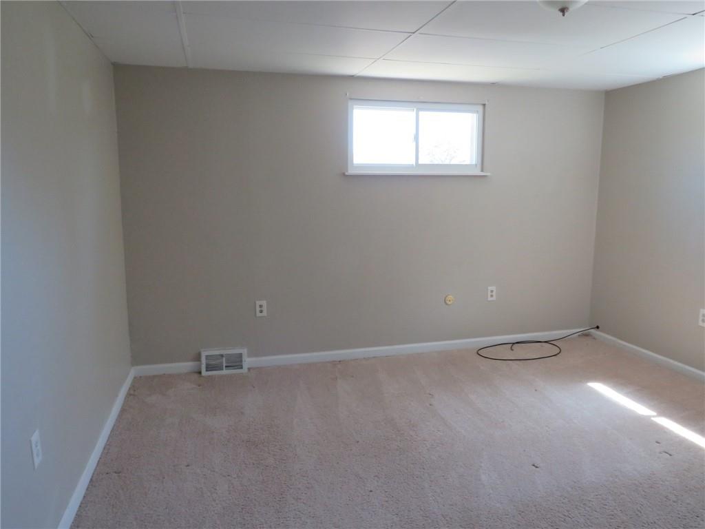 21 Daisytown Road Brownsville, PA 15417 - Photo 14 of 31 an empty room with a window