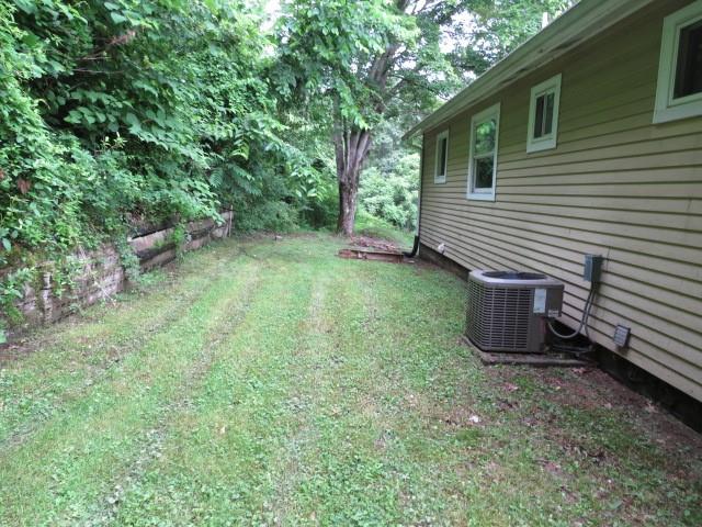 21 Daisytown Road Brownsville, PA 15417 - Photo 28 of 31 a view of a backyard with a large tree