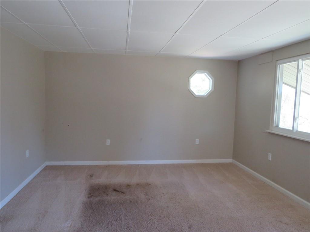 21 Daisytown Road Brownsville, PA 15417 - Photo 3 of 31 a view of an empty room with a window