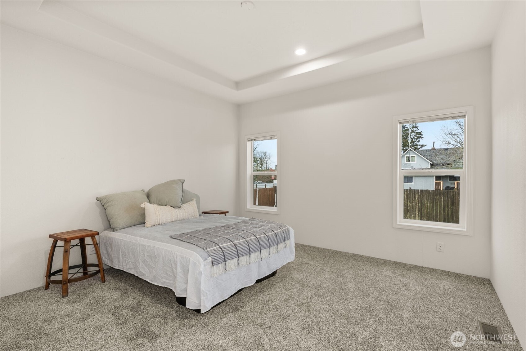 1257 Southwest Elzina Street Chehalis, WA 98532 - Photo 14 of 28 a bedroom with a bed lamp and window