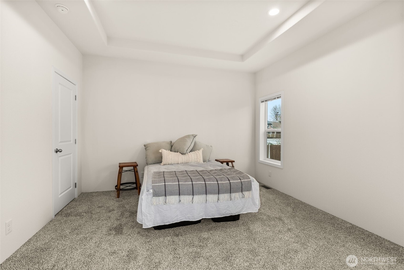 1257 Southwest Elzina Street Chehalis, WA 98532 - Photo 15 of 28 a bedroom with a bed and a window