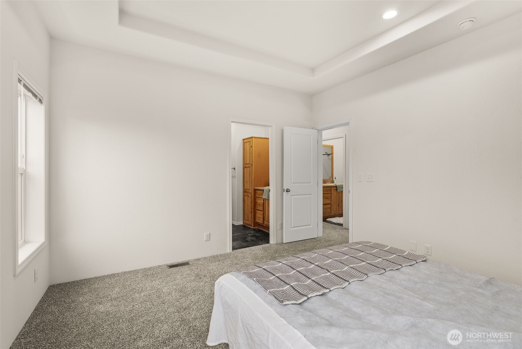 1257 Southwest Elzina Street Chehalis, WA 98532 - Photo 16 of 28 a bedroom with a bed and closet