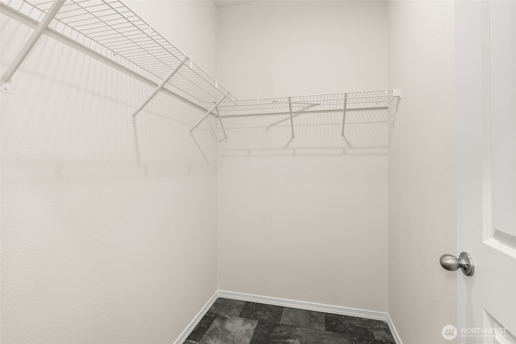 1257 Southwest Elzina Street Chehalis, WA 98532 - Photo 17 of 28 a view of a room with racks on the wall