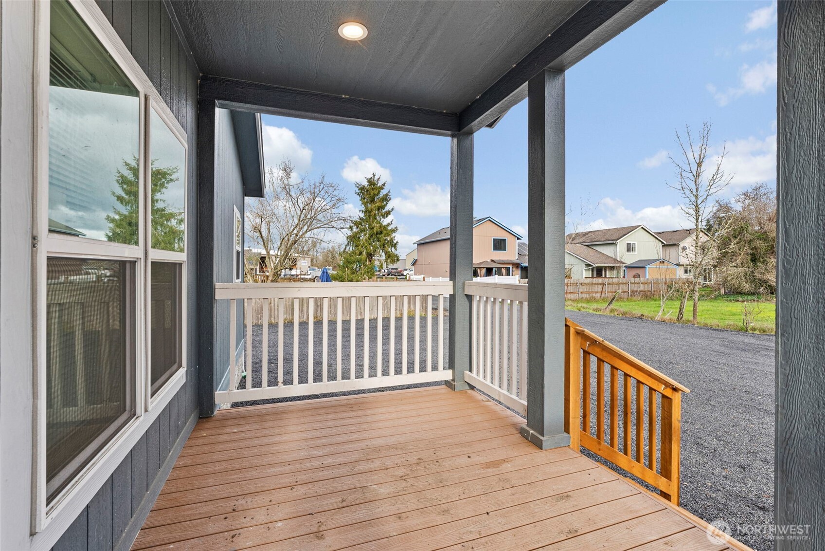 1257 Southwest Elzina Street Chehalis, WA 98532 - Photo 3 of 28 a view of a porch with wooden floor