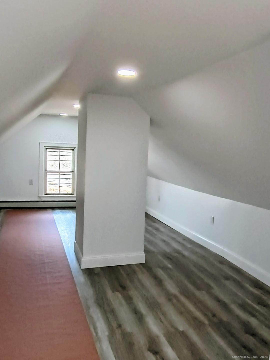 633 Wauregan Road Brooklyn, CT 06234 - Photo 8 of 15 an empty room with windows