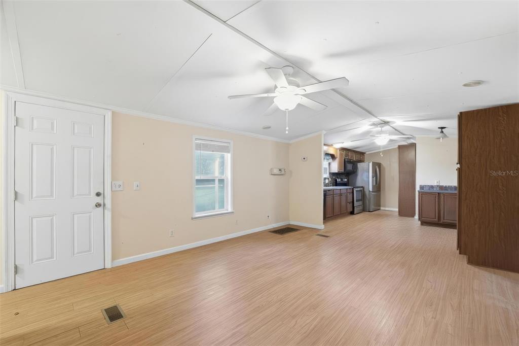 2220 Ellie Road, Unit A Auburndale, FL 33823 - Photo 12 of 41 a view of a livingroom with furniture and a ceiling fan