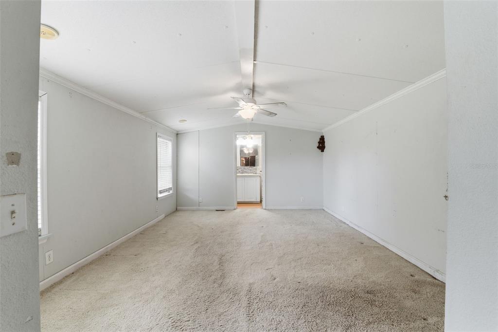 2220 Ellie Road, Unit A Auburndale, FL 33823 - Photo 15 of 41 a view of an empty room with a window