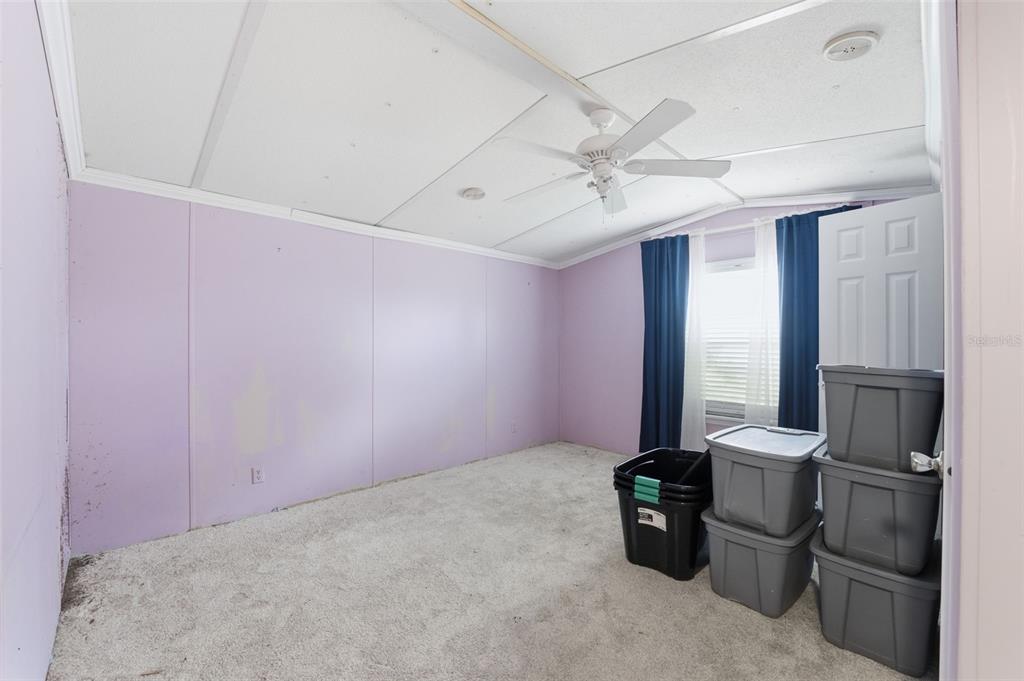 2220 Ellie Road, Unit A Auburndale, FL 33823 - Photo 17 of 41 a kitchen with refrigerator and window