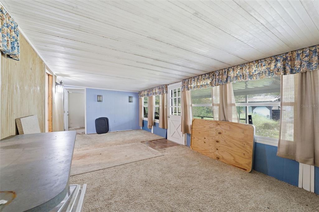 2220 Ellie Road, Unit A Auburndale, FL 33823 - Photo 21 of 41 a large bed sitting in a room next to a window