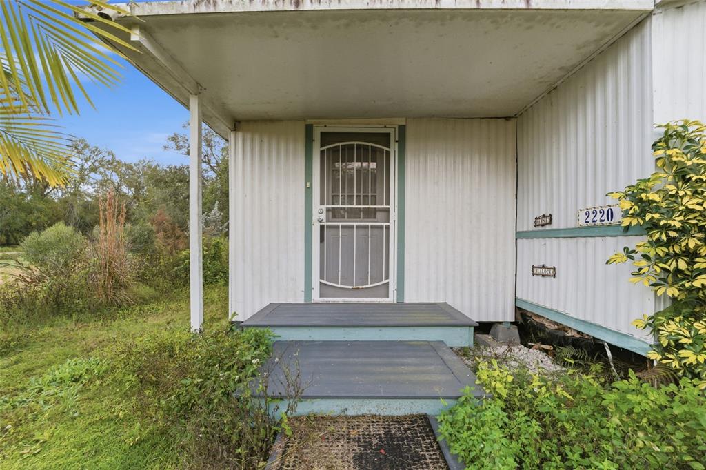 2220 Ellie Road, Unit A Auburndale, FL 33823 - Photo 8 of 41 a front view of a house with a yard