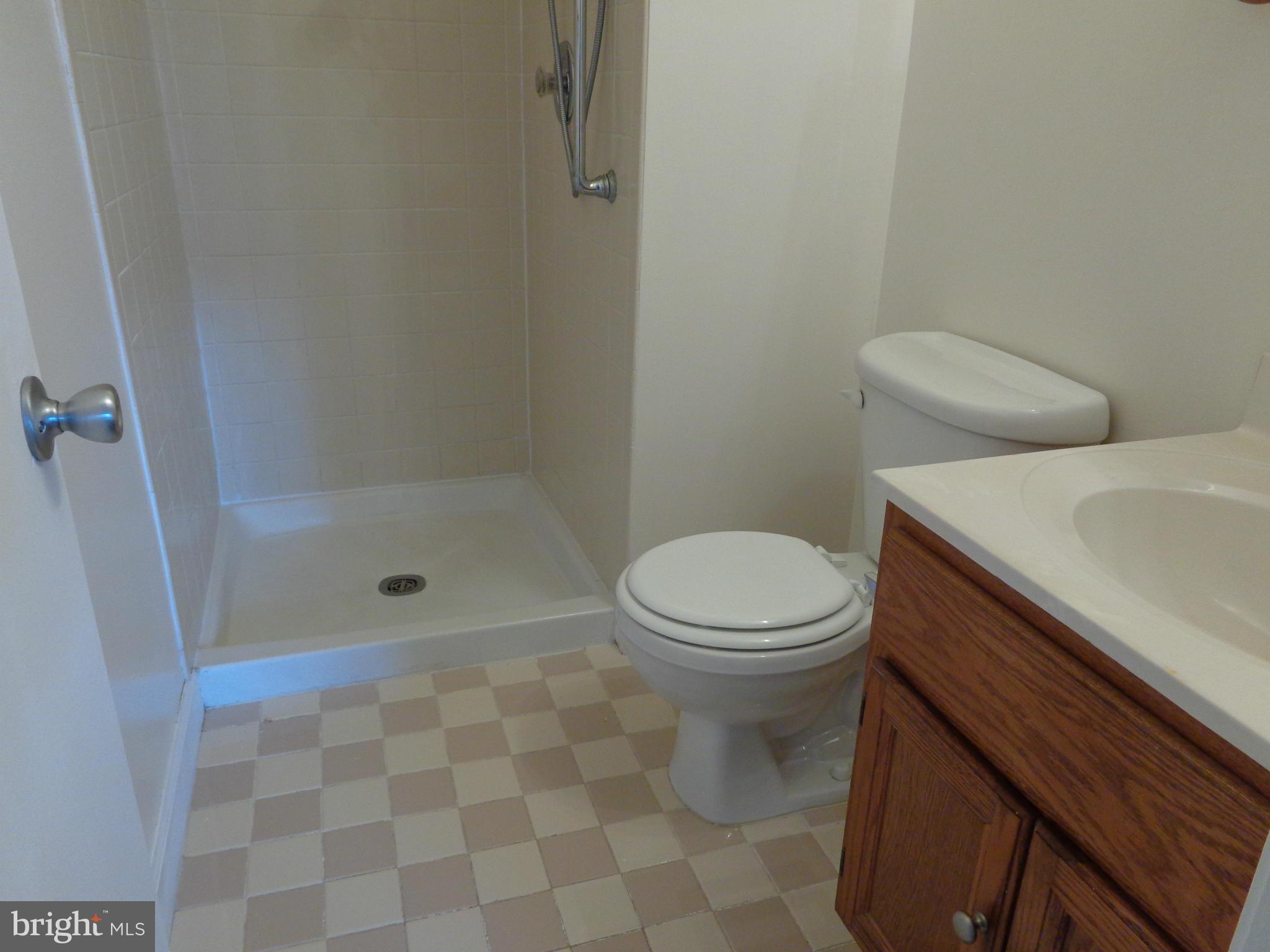 7782 Gateshead Lane Manassas, VA 20109 - Photo 15 of 17 a bathroom with a sink and a toilet