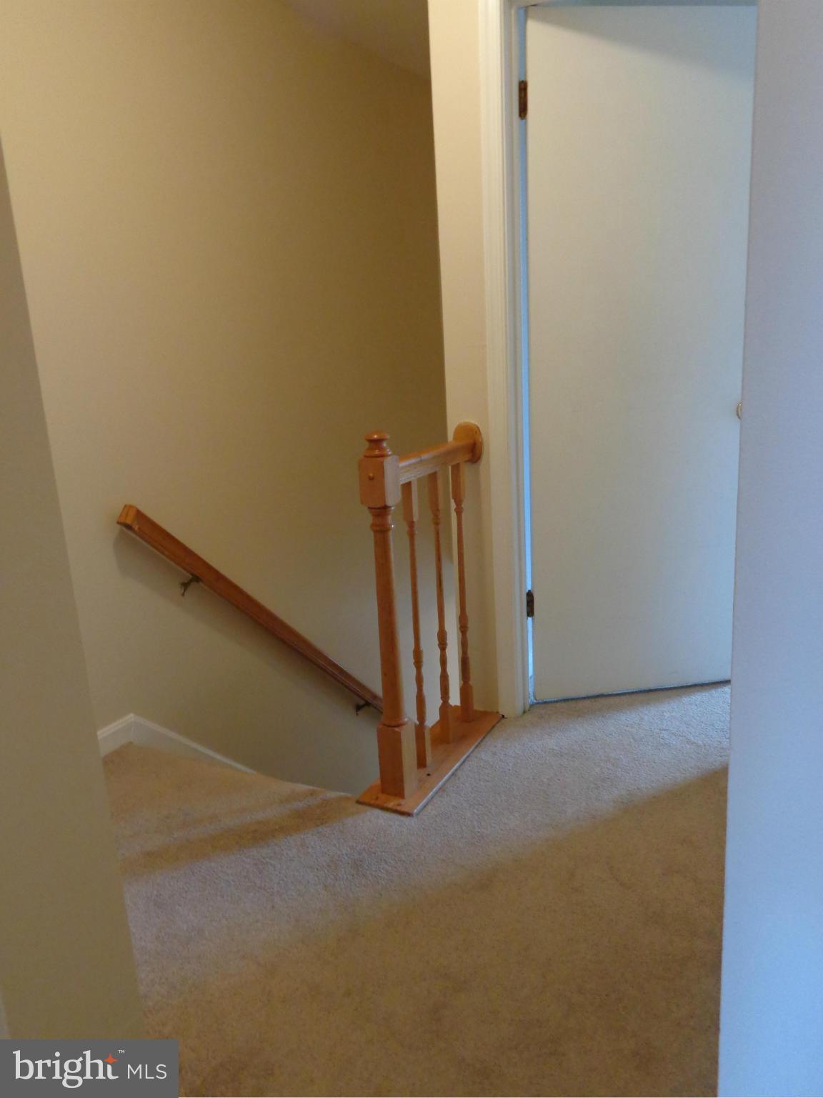 7782 Gateshead Lane Manassas, VA 20109 - Photo 16 of 17 a view of a room with stairs