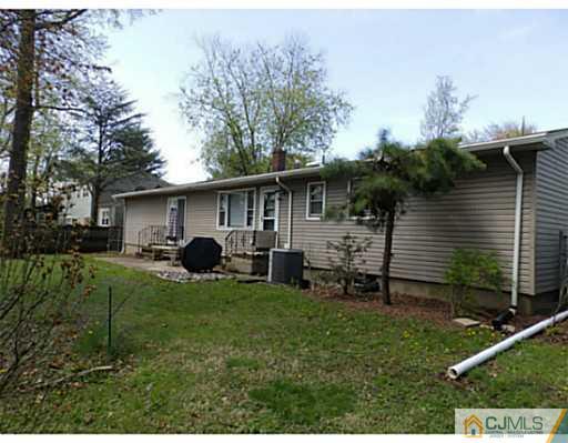 22 Lynnwood Road Edison, NJ 08820 - Photo 7 of 19 a view of a house with backyard