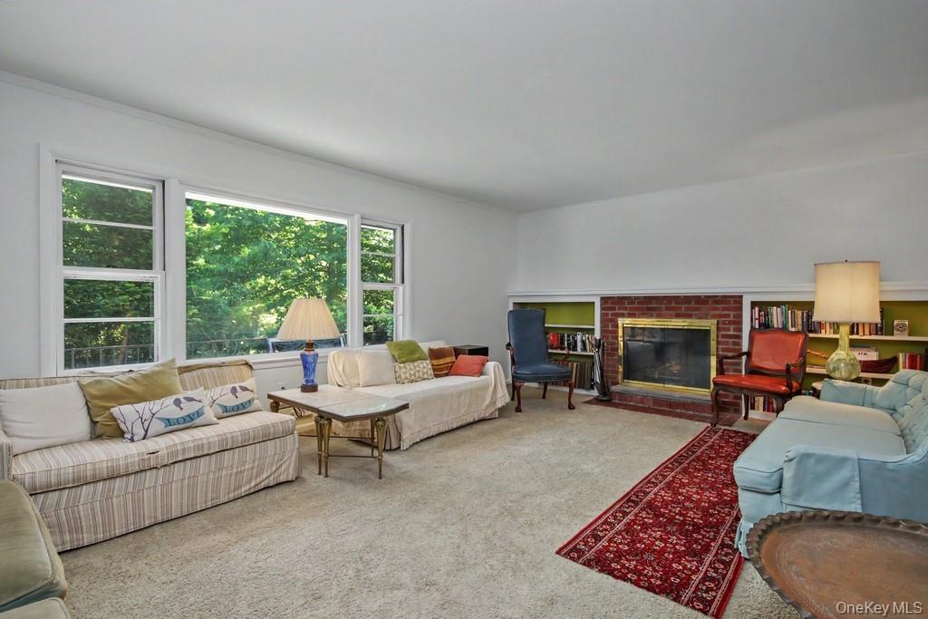 10 Lakeview Road Ossining, NY 10562 - Photo 12 of 38 Living Room has a brick fireplace and built in shelves