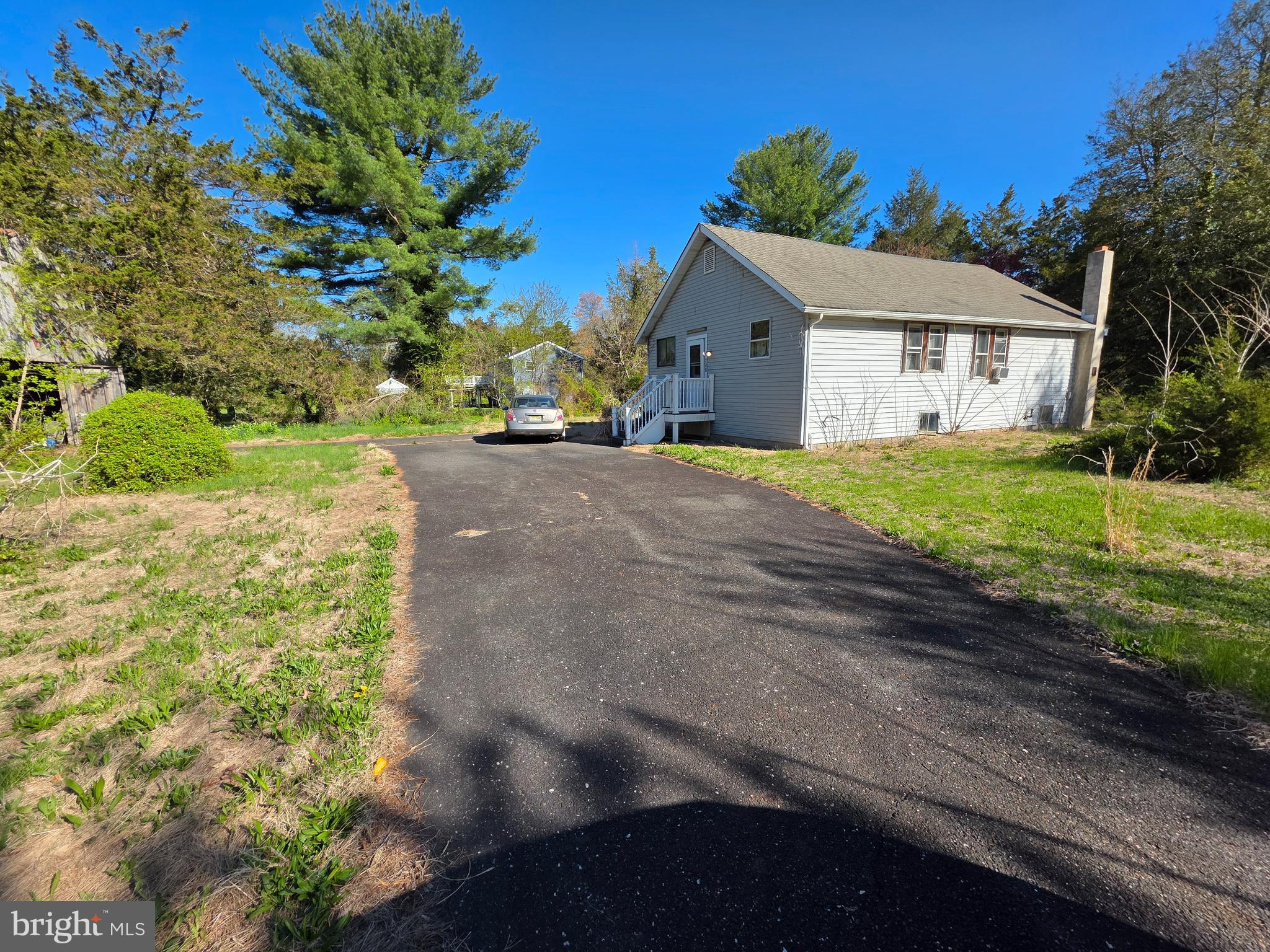 749 Little Mill Road Monroeville, NJ 08343 - Photo 6 of 8 a front view of a house with a yard and garage