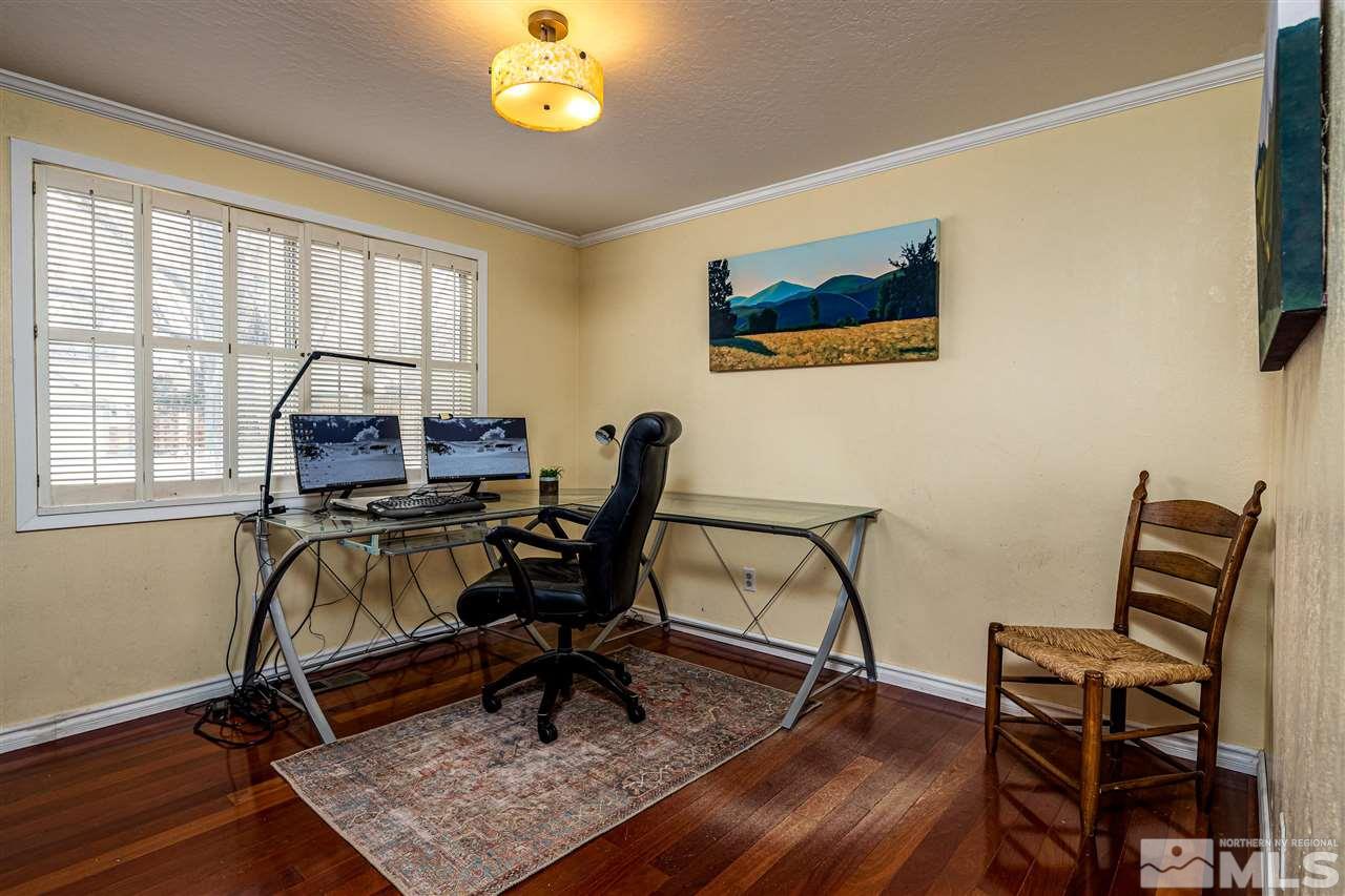 2401 Balsam Street Reno, NV 89509 - Photo 11 of 18 a view of a workspace with furniture and a window