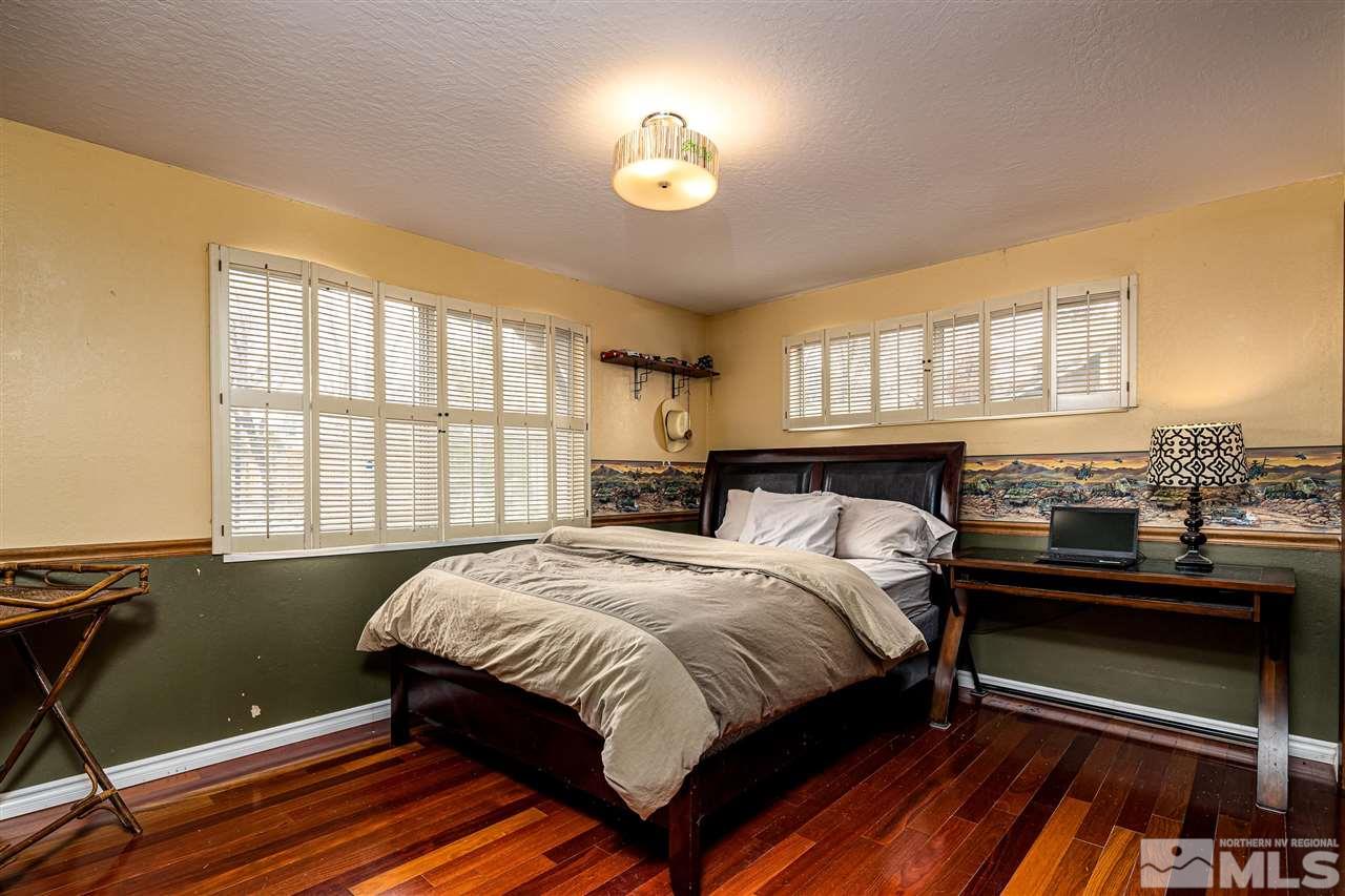 2401 Balsam Street Reno, NV 89509 - Photo 14 of 18 a bedroom with a bed and a window