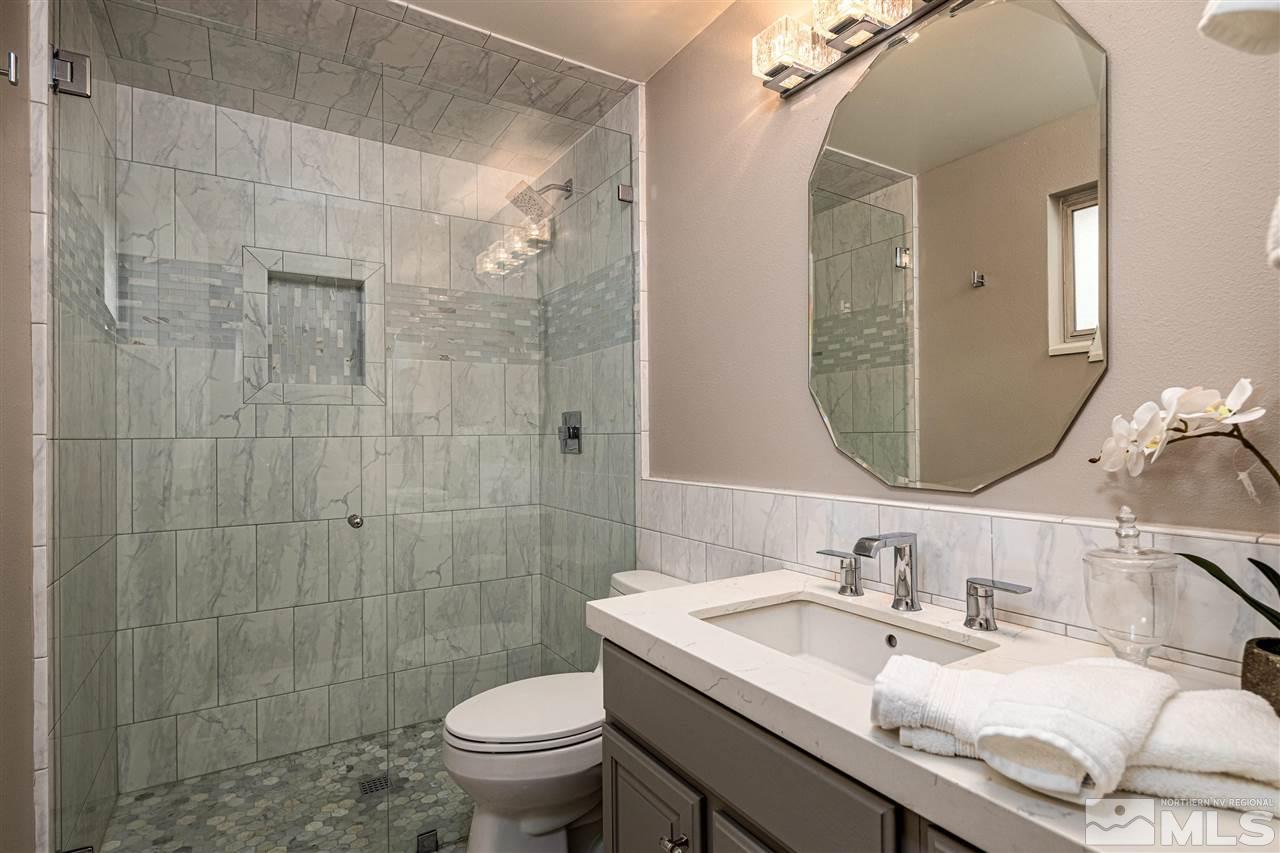 2401 Balsam Street Reno, NV 89509 - Photo 17 of 18 a bathroom with a sink toilet and shower