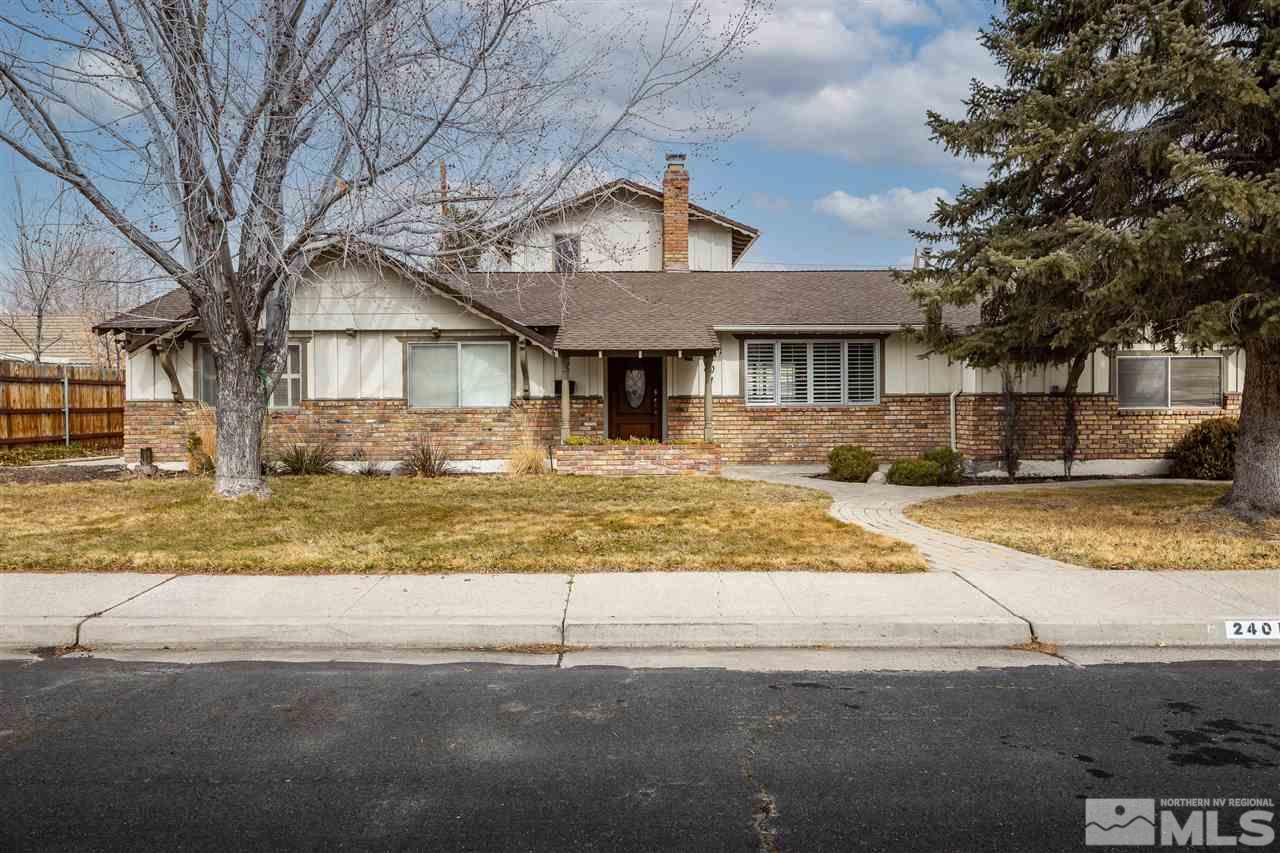 2401 Balsam Street Reno, NV 89509 - Photo 2 of 18 a front view of a house with a yard