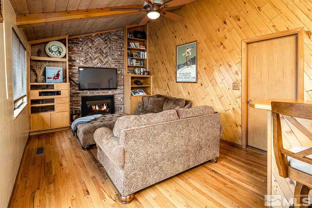 2401 Balsam Street Reno, NV 89509 - Photo 7 of 18 a living room with furniture and a flat screen tv