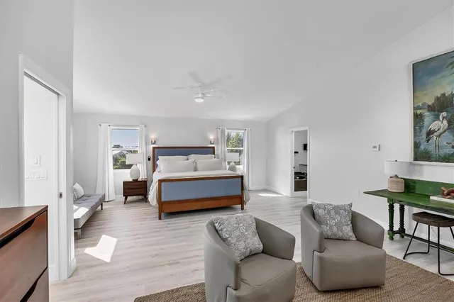 a bedroom with furniture and a couch