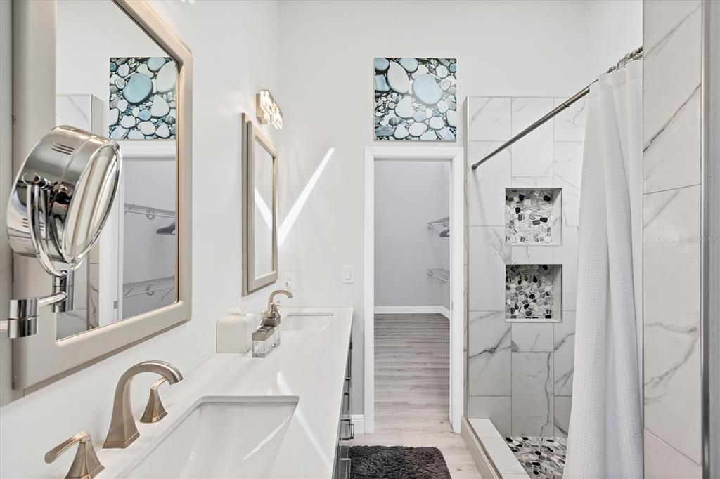 401 Lafitte Street Boca Grande, FL 33921 - Photo 20 of 37 a bathroom with a shower and a sink