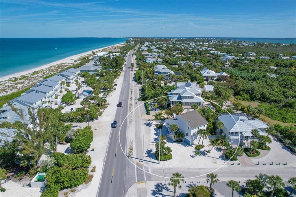 401 Lafitte Street Boca Grande, FL 33921 - Photo 2 of 37 an aerial view of residential houses with outdoor space and street view
