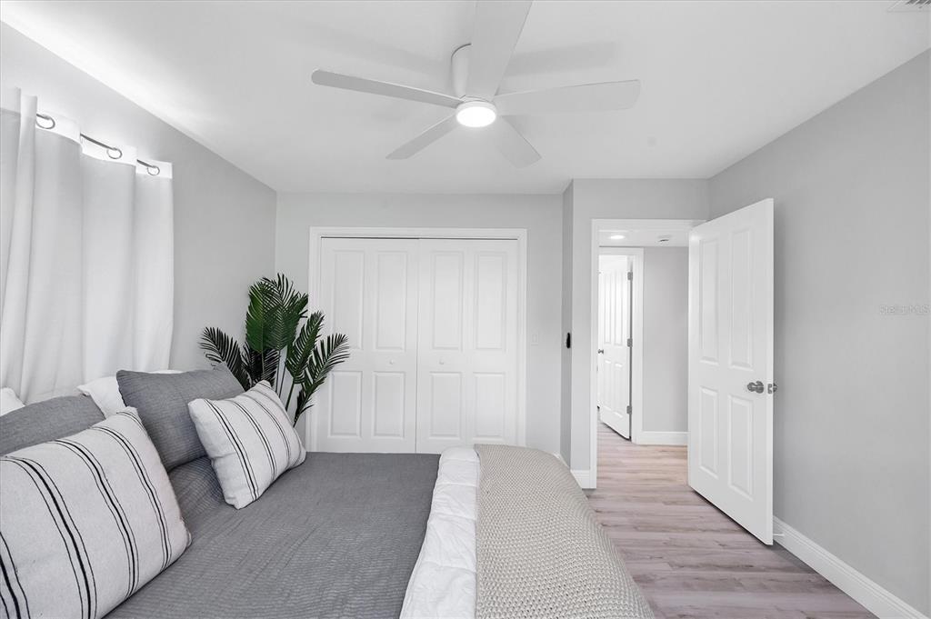 401 Lafitte Street Boca Grande, FL 33921 - Photo 23 of 37 a living room with furniture and a potted plant