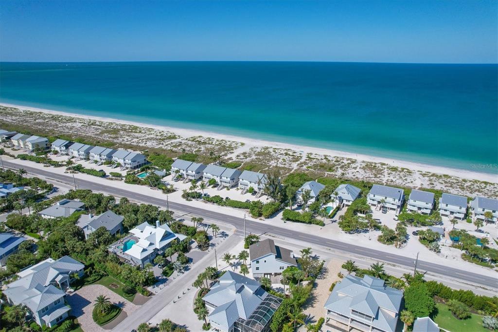 401 Lafitte Street Boca Grande, FL 33921 - Photo 5 of 37 a view of a balcony and wooden floor