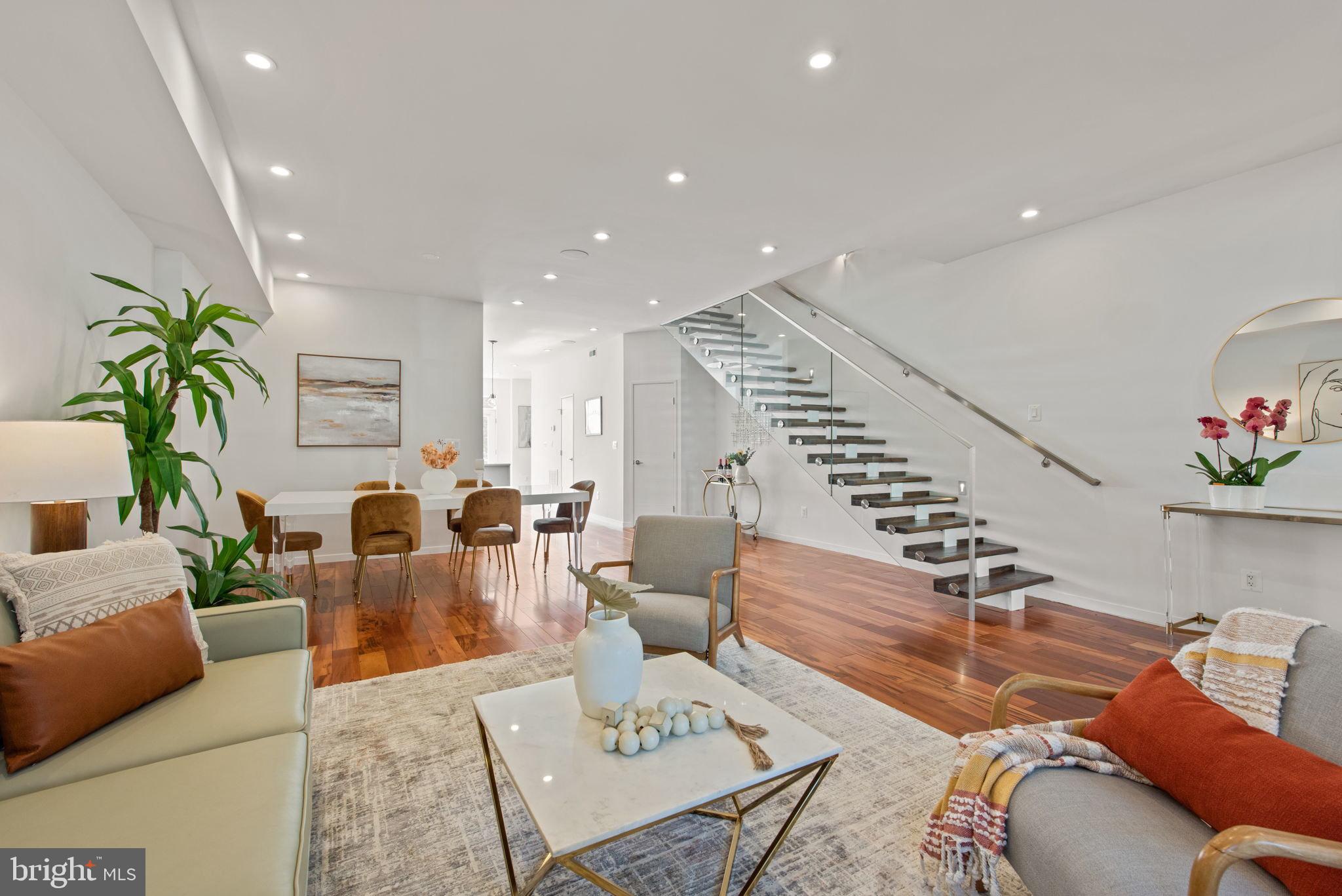 1404 Decatur Street Northwest Washington, DC 20011 - Photo 4 of 32 With a contemporary floating staircase...