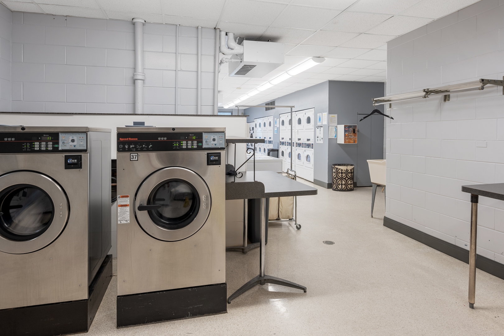 5445 North Sheridan Road, Unit 1212 Chicago, IL 60640 - Photo 12 of 14 a view of a storage & utility room with washer and dryer
