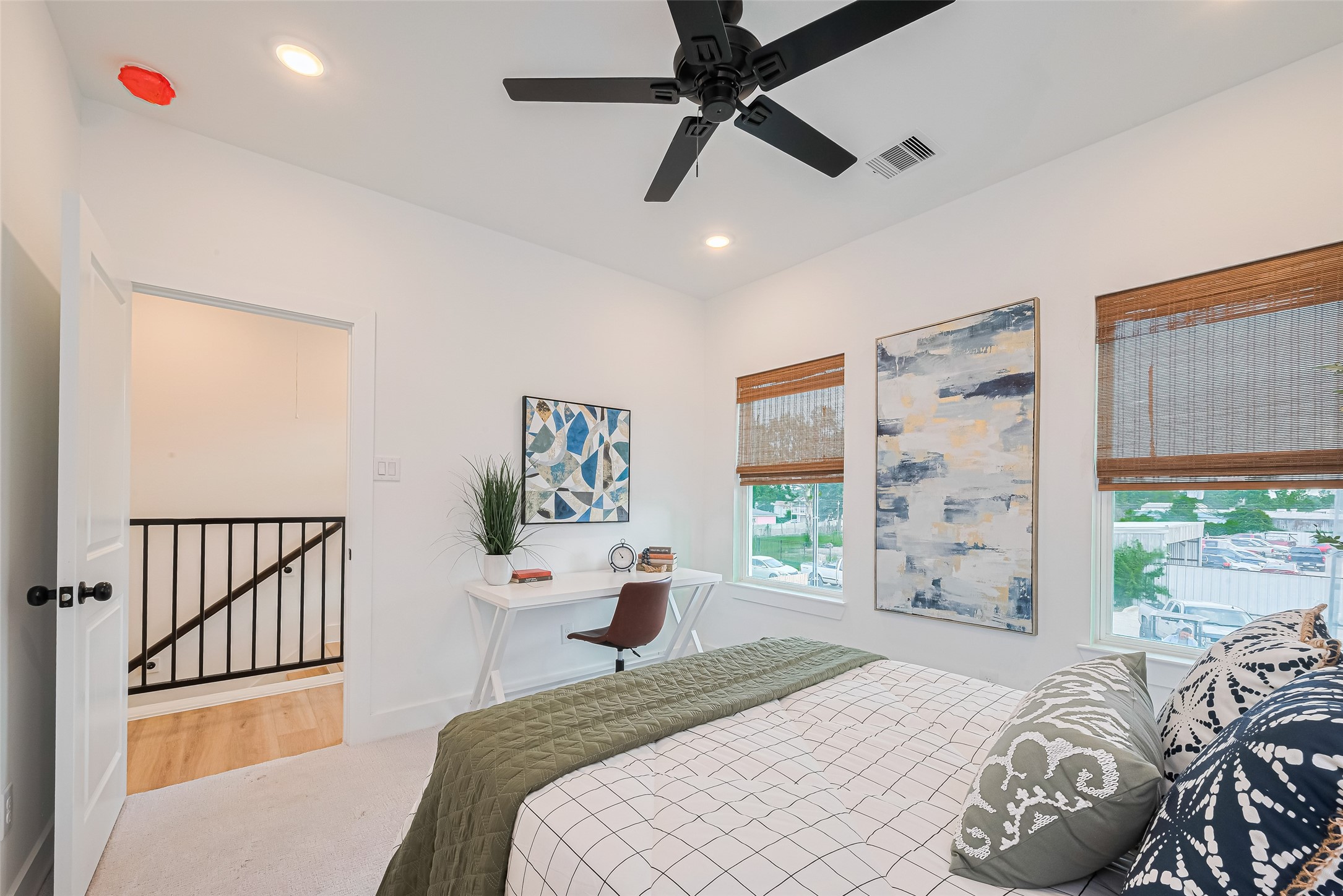 9437 Pembrook Street Houston, TX 77016 - Photo 14 of 25 a bedroom with a bed and a window