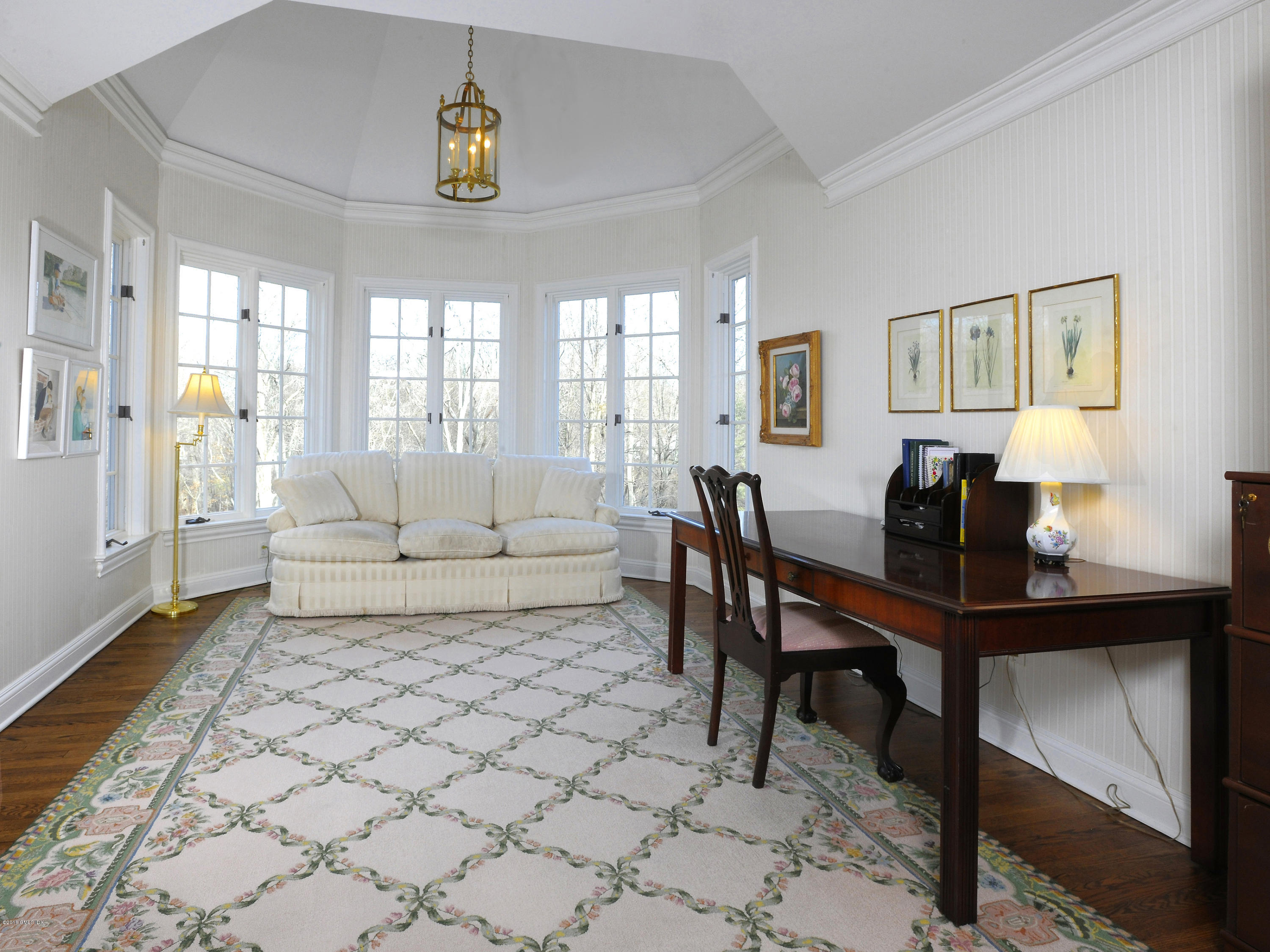 526 North Street Greenwich, CT 06830 - Photo 22 of 40 a living room with furniture and a table