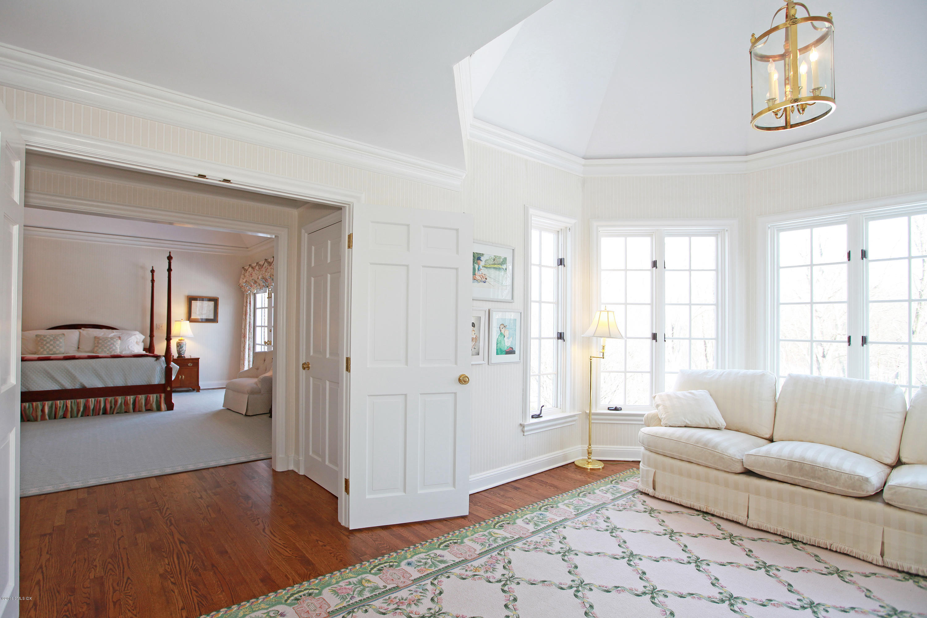 526 North Street Greenwich, CT 06830 - Photo 23 of 40 a living room with furniture and a rug