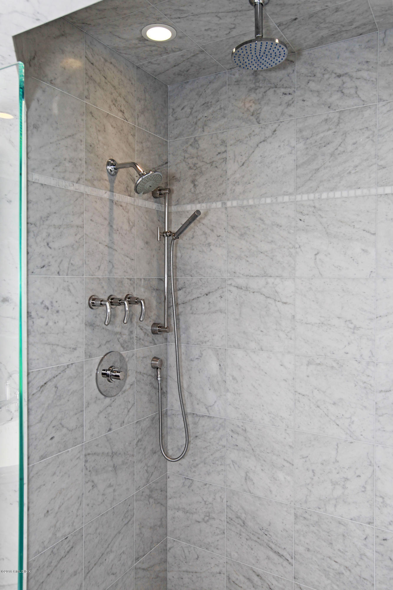 526 North Street Greenwich, CT 06830 - Photo 26 of 40 a bathroom with a shower