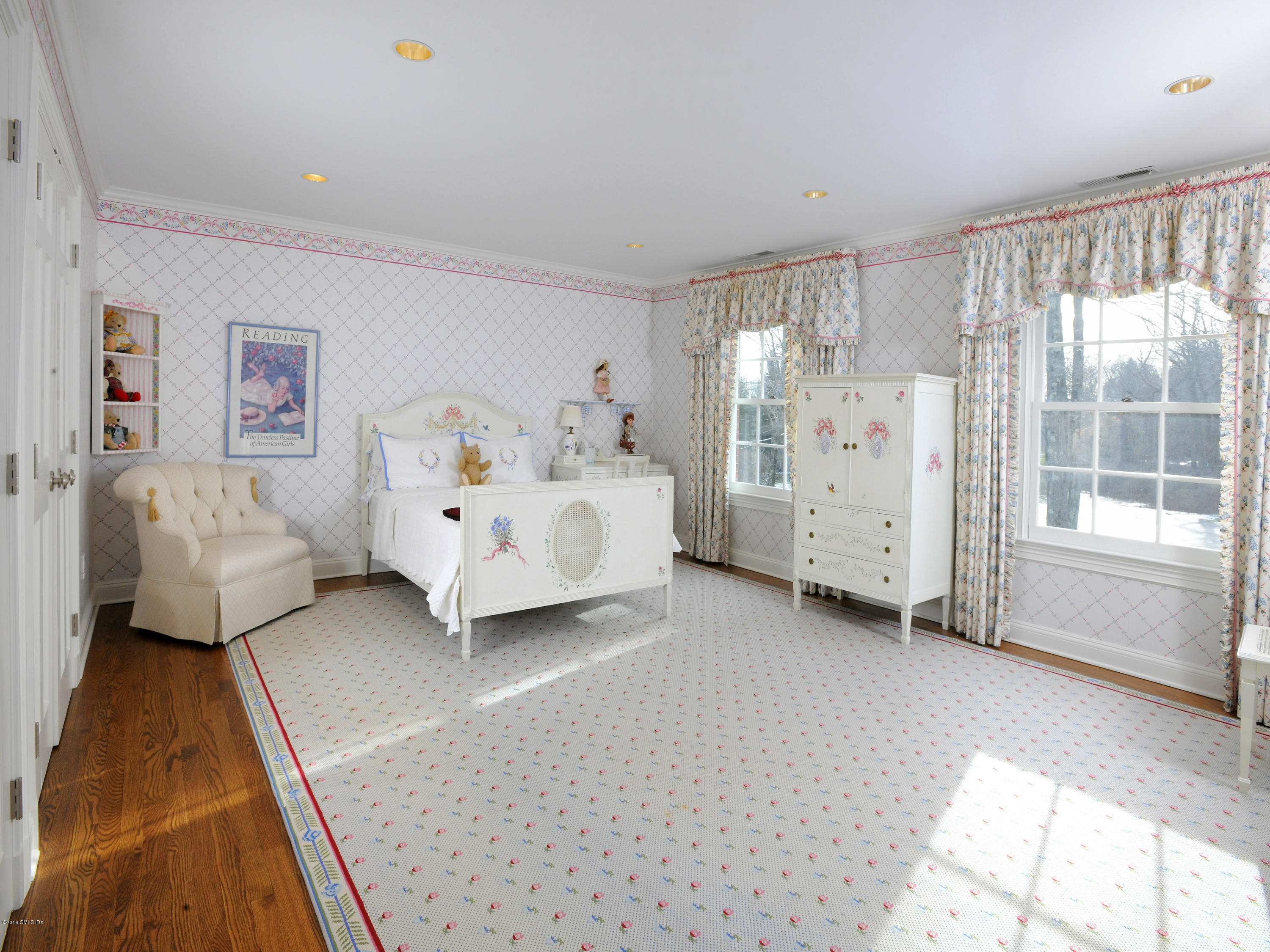 526 North Street Greenwich, CT 06830 - Photo 28 of 40 a bedroom with bed and window