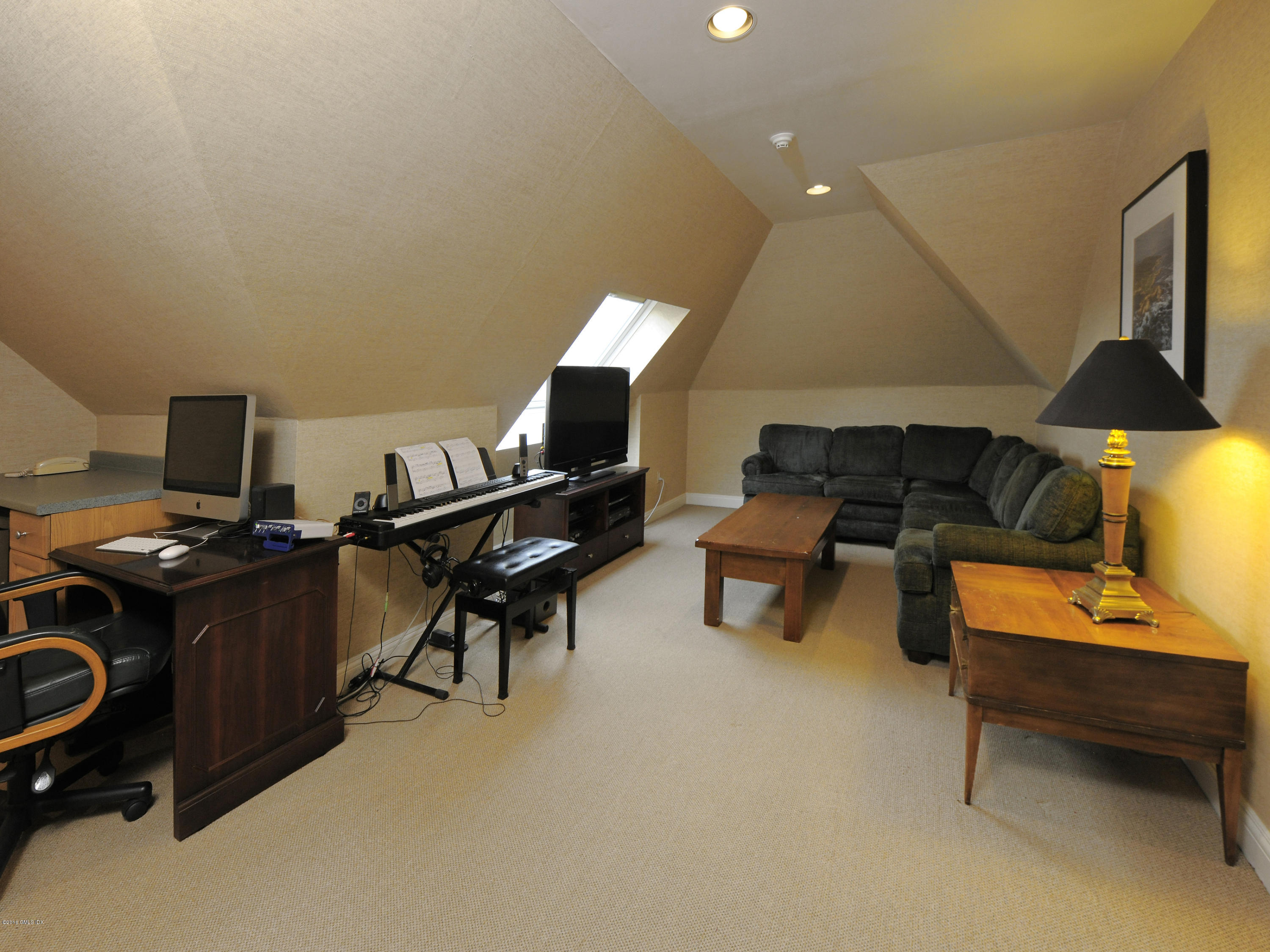 526 North Street Greenwich, CT 06830 - Photo 32 of 40 a living room with furniture and a piano