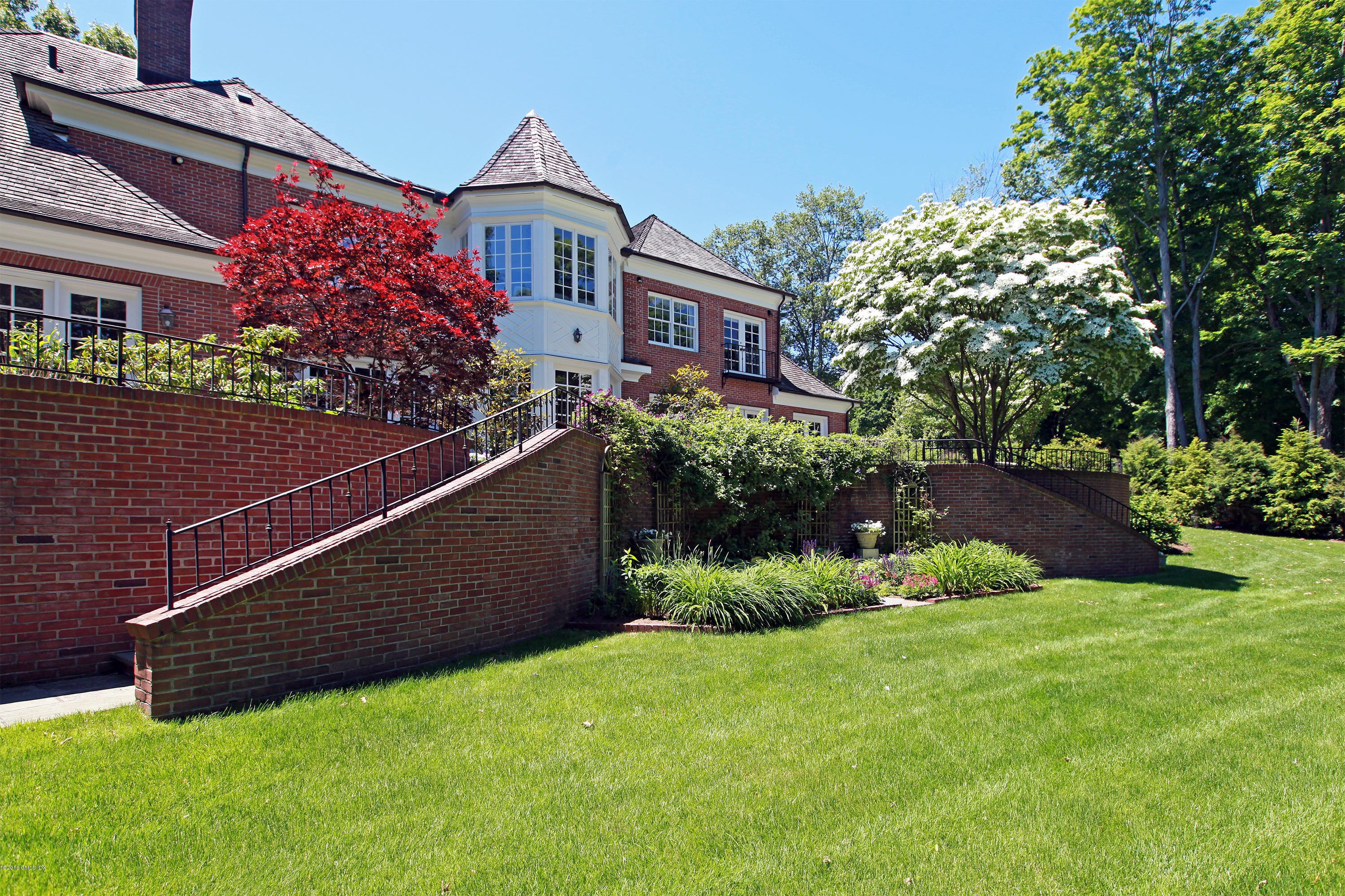 526 North Street Greenwich, CT 06830 - Photo 33 of 40 a view of a kid s in front of a house