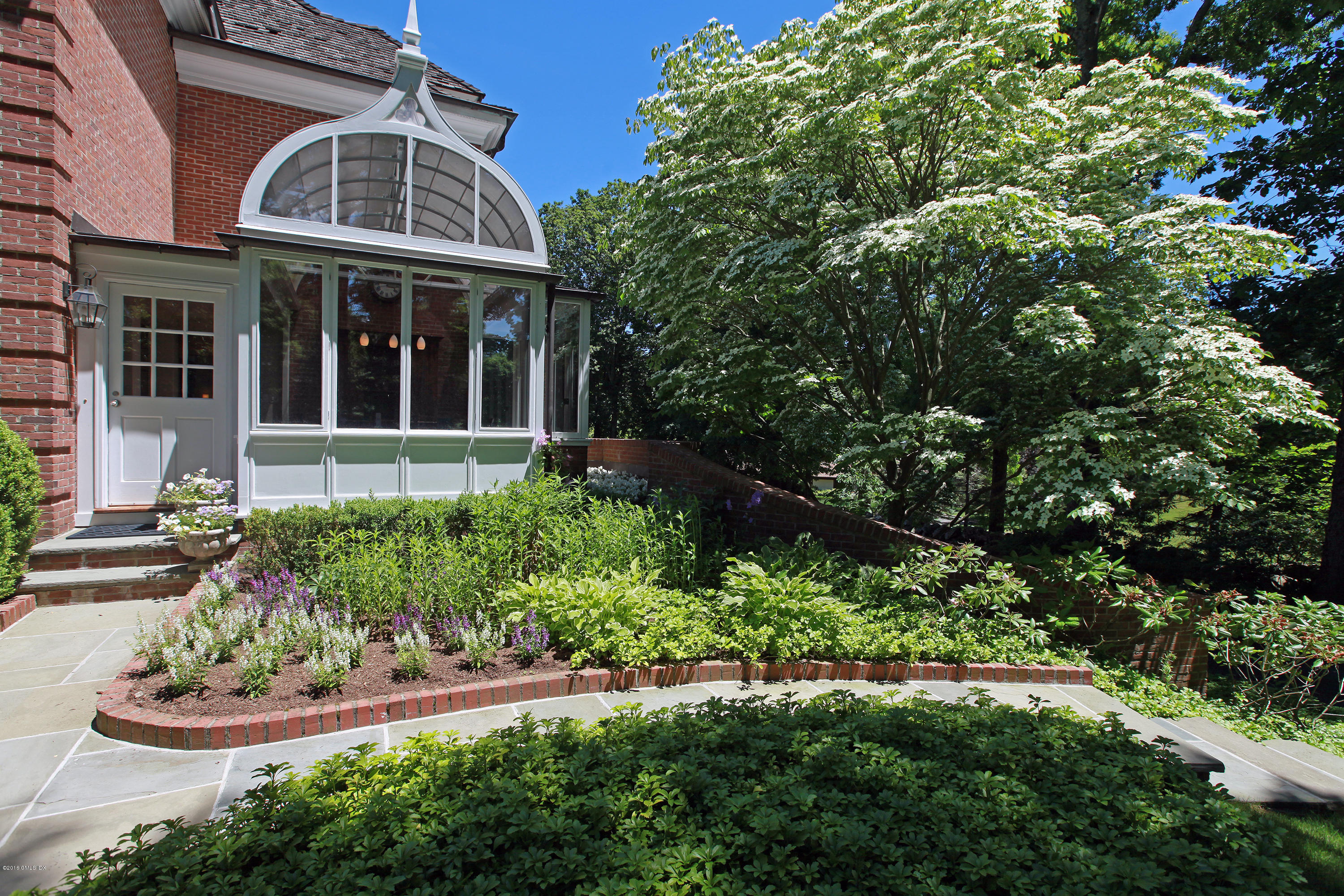 526 North Street Greenwich, CT 06830 - Photo 36 of 40 front view of a house with a yard