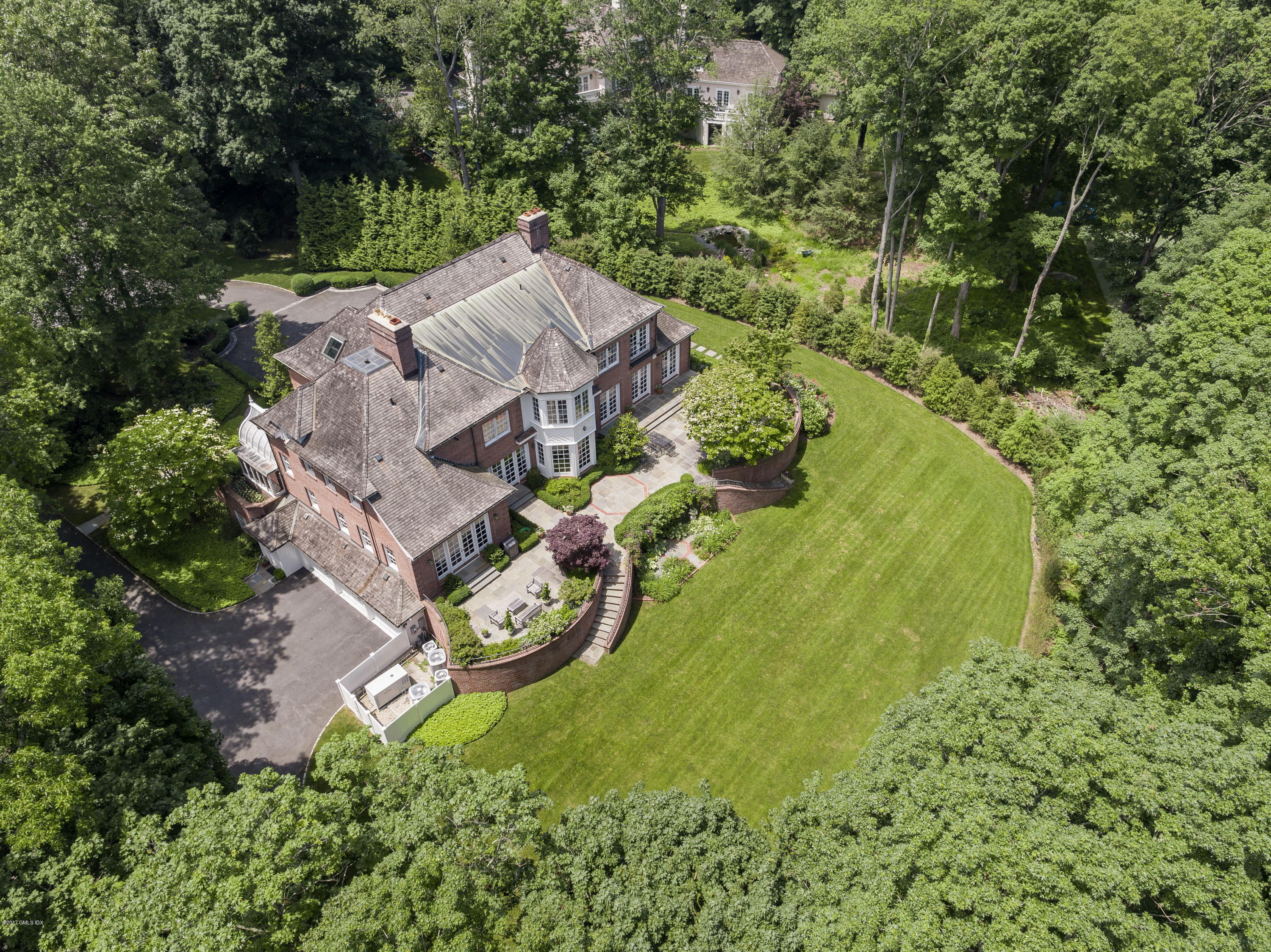 526 North Street Greenwich, CT 06830 - Photo 5 of 40 an aerial view of a house with a yard