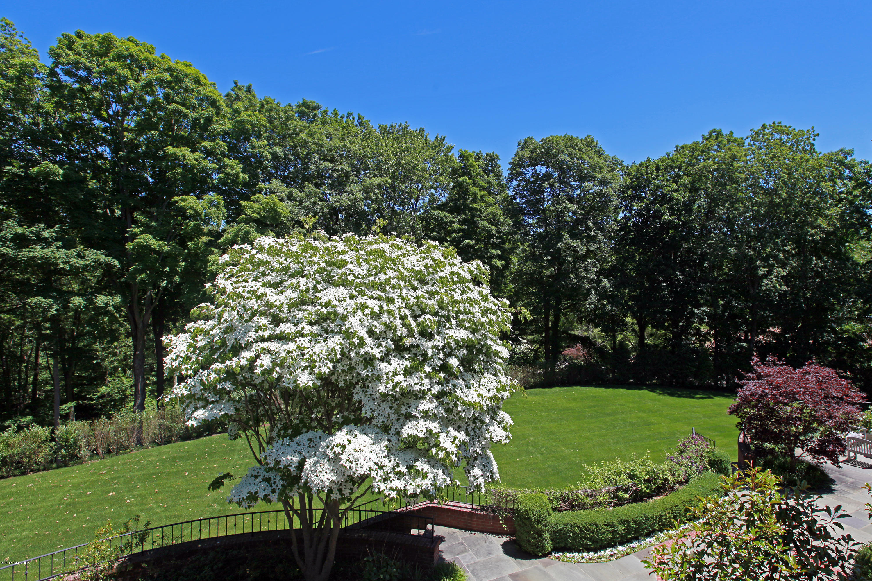 526 North Street Greenwich, CT 06830 - Photo 7 of 40 a view of a garden